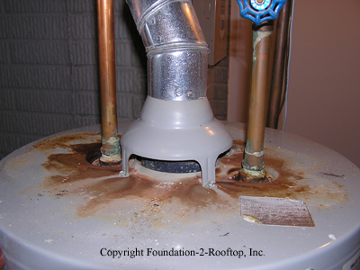 Backdrafting water heater flue pipe.