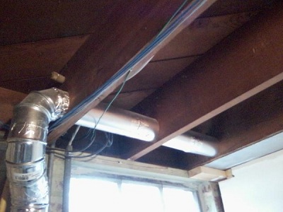 You can't cut through structure to install a dryer vent.