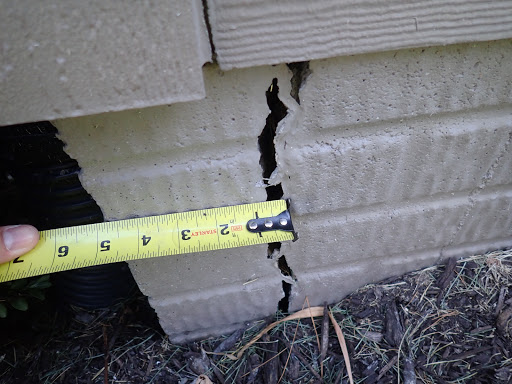 Street Creep - Concrete Driveway Issues (Omaha Home Inspection)